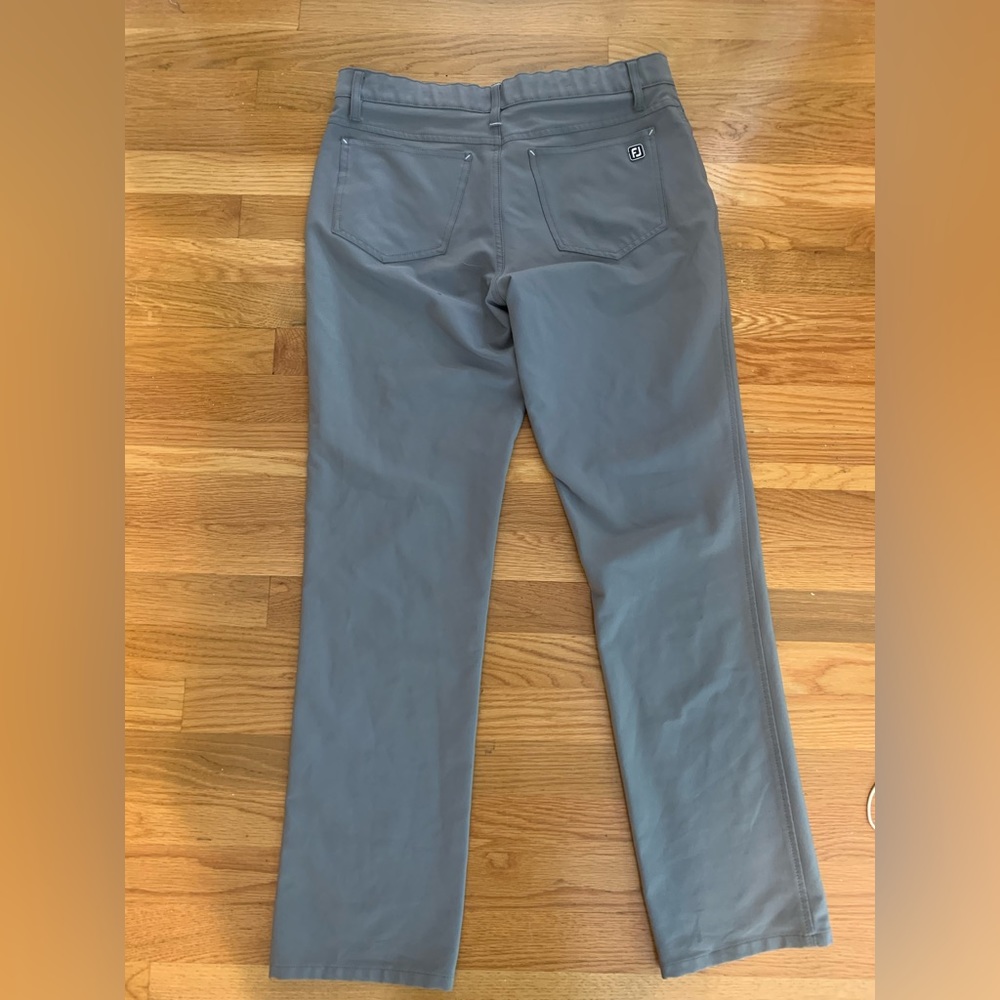 Footjoy five pocket tour golf pants.